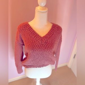 Mauve pink cropped sweater.